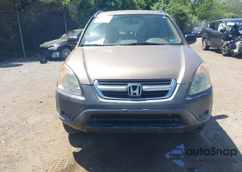 2004 Honda Cr-V Lx z USA, uszkodzony, nr VIN JHLRD68444C015503